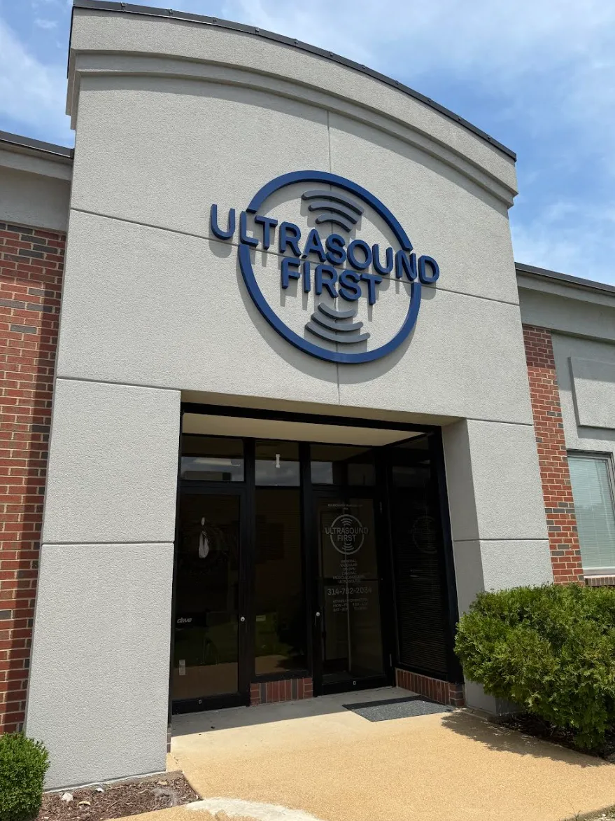 The Ultrasound First building entrance with the logo mounted above the door